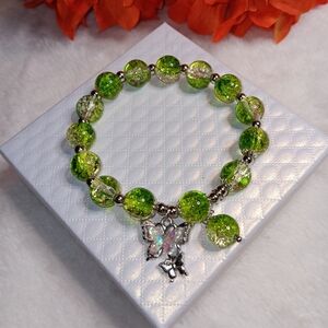 Green Beaded Bracelet with Butterfly Charm